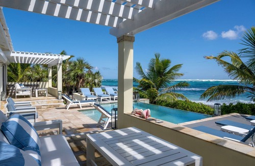 Double Bay House | Private Estate on Pink Sand Beach w/2 Pools, Home Theater, Kayaks, PBoards