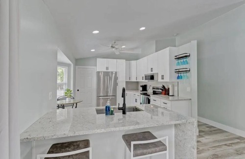 Royal Palm Beach House | Private Home with Oasis Backyard w/Pool, BBQ, King Beds