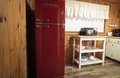Bryson City Cabin | Private HOT TUB. Fire Pit, screened porch. 3 miles to the NOC. Resort POOL