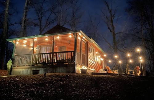 Bryson City Cabin | Private HOT TUB. Fire Pit, screened porch. 3 miles to the NOC. Resort POOL