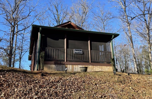 Bryson City Cabin | Private HOT TUB. Fire Pit, screened porch. 3 miles to the NOC. Resort POOL