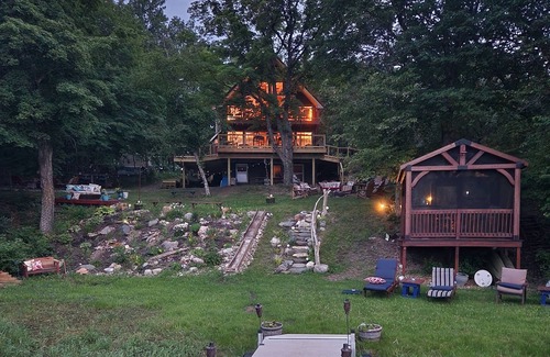 Farwell Cabin | Private lake, with private sandy beach. Beautiful five bedroom.