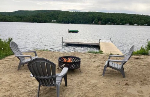 Concord RV Rental | Private Lakeside Camping with Included Tent, Air Mattresses, Kayaks, Fire Wood