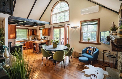 Yulan House | Private log cabin nestled at the base of a secluded wooded area n