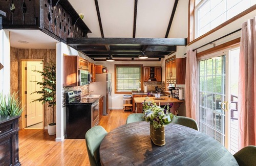 Yulan House | Private log cabin nestled at the base of a secluded wooded area n