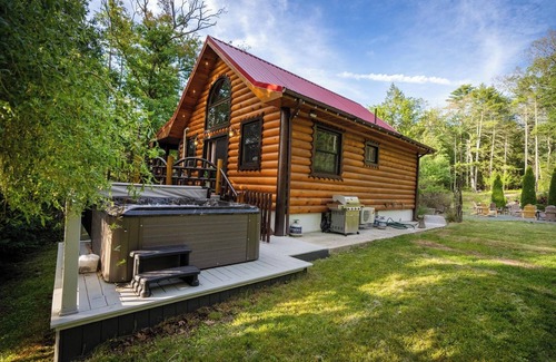 Yulan House | Private log cabin nestled at the base of a secluded wooded area n