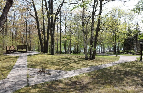 Presque Isle Cottage | Private log cabin with view overlooking Grand Lake