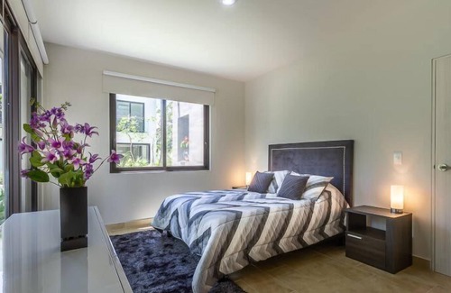 Villa Juarez Condo | Private Patio w/Lagoon View+Pools, Gym, Cafe, Golf