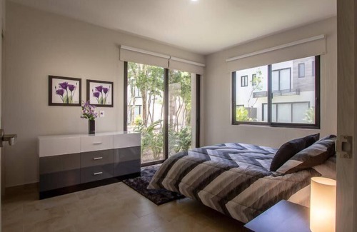 Villa Juarez Condo | Private Patio w/Lagoon View+Pools, Gym, Cafe, Golf