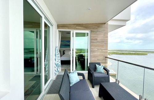 San Pedro Condo | PRIVATE PENTHOUSE VIEWS on the TOP/5th FLOOR! 2 Bedroom Condo at SUNSET CARIBE!