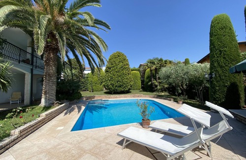 Montioni Apartment | Private pool & palm garden. Villa Colombara with lake view