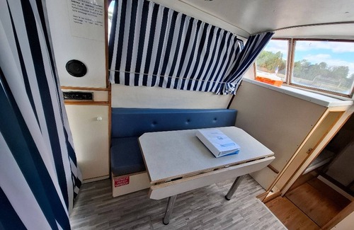Chenille-Change Boat Rental | Private Riverside Boat Stay in Quaint Chenillé-Changé for 5 Guests