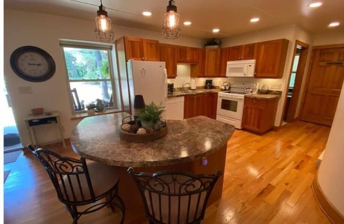 West Branch Cabin | Private setting in the woods on the Rifle River. 8 mi from Dream &Nightmare