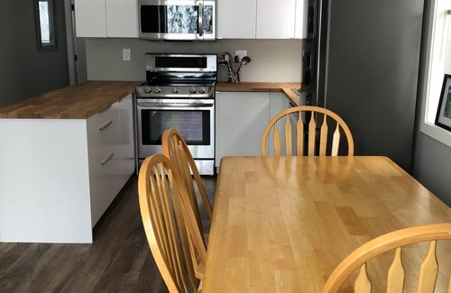 Silver Star Mountain Apartment | Private suite with semi-private hot tub, and BBQ - pet friendly too!