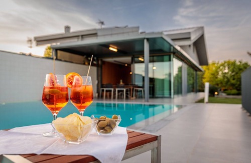 Arzergrande Villa | Private Villa with sauna, WIFI, private pool, A/C, hot tub, TV, patio, pets allowed, parking