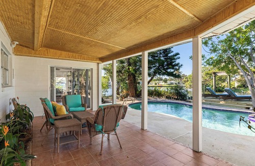 River Isles House | Private wooded 3BR/3BA house w/heated pool on canal just steps from beach