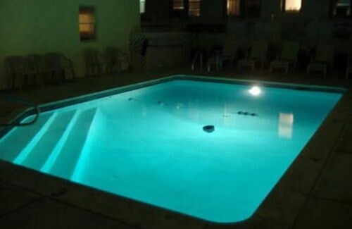 North End Condo | Professionally decorated with in ground pool. 1 1/2 blocks to the beach, boardwalk and shopping. Assigned off street parking!