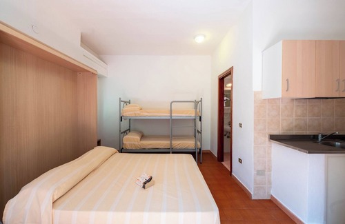 Grotta dell'acqua Resort | Property In A Holiday Village 'Monolocale 3 Posti Letto' with Shared Pool and Air Conditioning