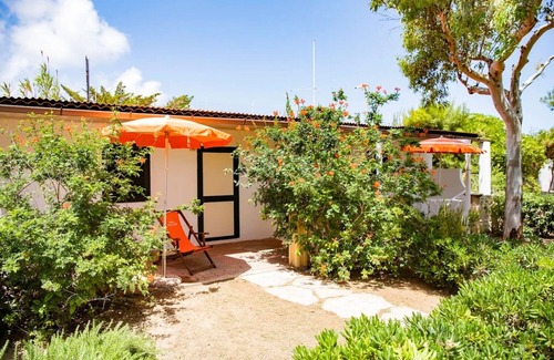 Chiesiola Resort | Property in a holiday village 'Baia Falcone - Standard 305' with sea view and air conditioning