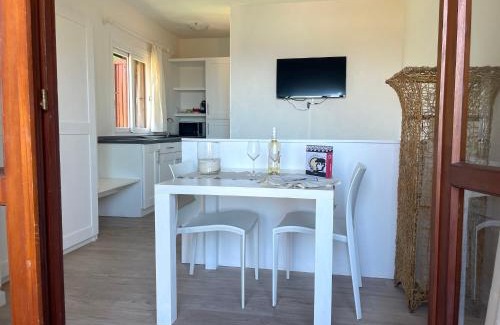 Capo Coda Cavallo Apartment | PUNTA EST Spazioso Monolocale Vista Mare