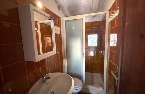 Capo Coda Cavallo Apartment | Punta Est Trilocale Soppalco con Terrazza Vista Mare