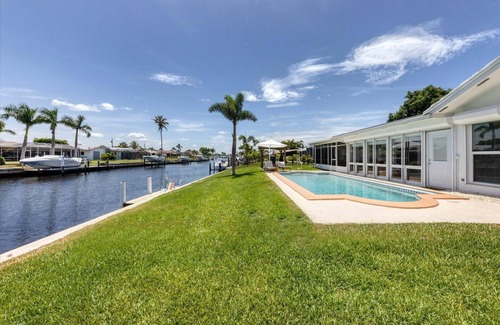Punta Gorda House | Punta Gorda Isles 2-Bedroom Private Pool Home on Canal with Dock