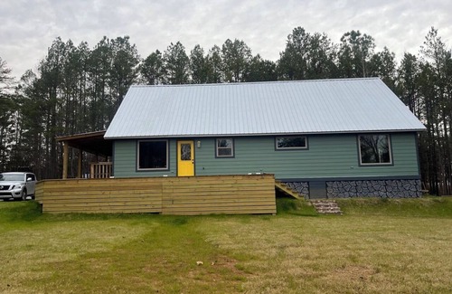 Oxford House | Quaint cabin style house, modern finish, Beautiful open concept and pond view