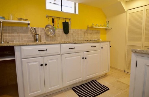 Fairfield House | Quaint House with Patio, situated on a cliff overlooking the woods