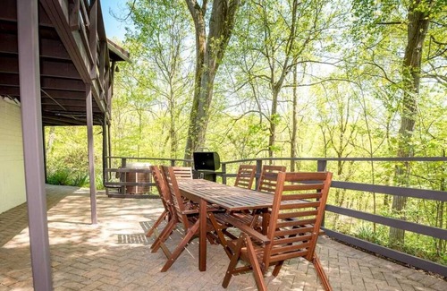 Fairfield House | Quaint House with Patio, situated on a cliff overlooking the woods