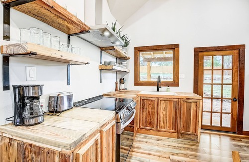 Marble Falls House | Quaint house with washer/dryer, central AC, patio, & spacious backyard