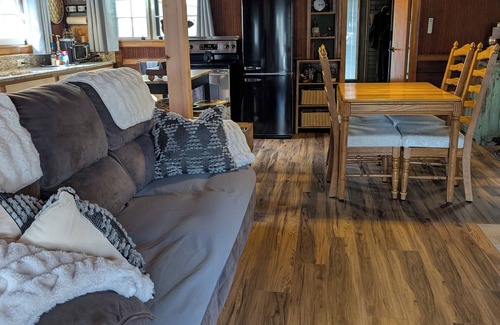 Wooster Cabin | Quaint Newly Remodeled Cabin with Stone Fireplace - Private Hot Tub - King Bed