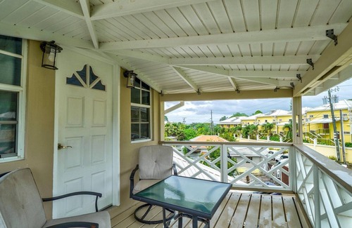 Calliste Apartment | Quaint one bedroom unit steps away from beach access