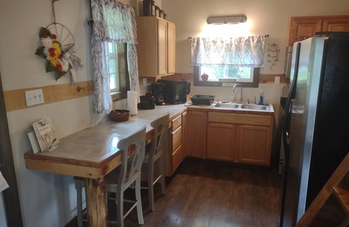 Frenchburg Cabin | Quaint, secluded cabin with the feel of home. Sleeps 4 with home-like amenities.