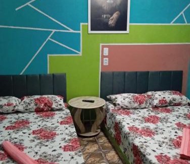 Aparecida House | Quarto, garagem, portão automático, banheiro, wi-fi, tv, frigobar e ventilador de teto