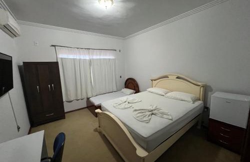 Sinop House | Quarto no centro com 2 camas e hidromassagem