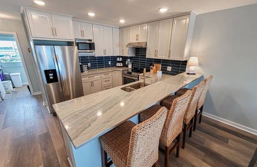 Topsail Beach Condo | Queen's Grant E-116 – Oceanfront Serenity Awaits