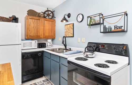 La Pointe Apartment | Queen Suite at Ferry Landing Suites in Downtown La Pointe!