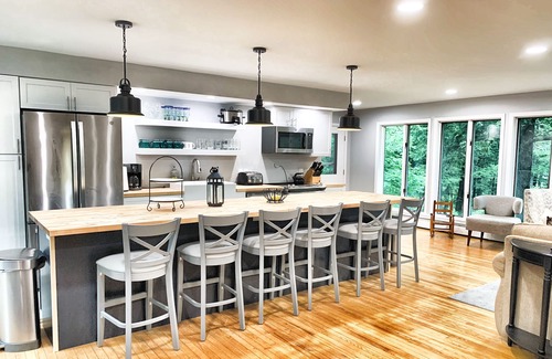 Oakland House | Quiet, 6 bedroom 4 bath Lakefront home, private sandy beach, near Colby College