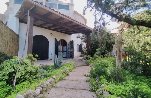 Sa Rocca Tunda Apartment | Quiet Ground Floor Apartment 20 meters from the Sea with Private Garden & BBQ