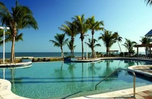 Key West Condo | QUIET KEY WEST RESORT NEXT TO AIRPORT - FANTASY FEST - 2/2 WATERFRONT BALCONY