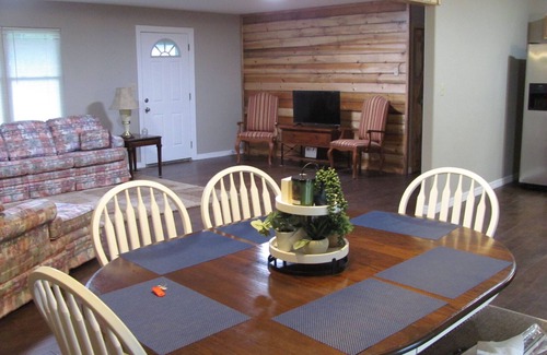 Atkins House | Quiet neighborhood with covered patio & plenty of space for family and friends!