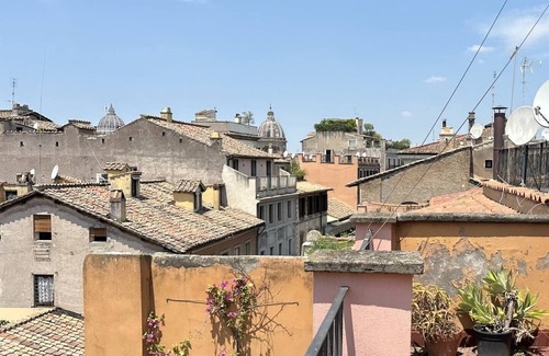 Rione VII Regola Apartment | Quiet Piazza Navona Apartment with Courtyard Patio, Lift & Rooftop Views