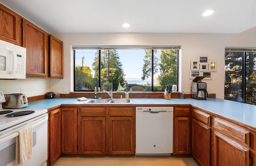 The Bowl of Edmonds House | Quiet Puget Sound view home near downtown Edmonds with a fireplace