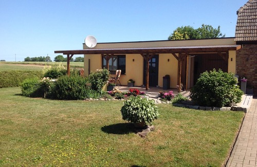 Garz/Rugen Apartment | Quiet situated bungalow with a terrace overlooking the water and in nature