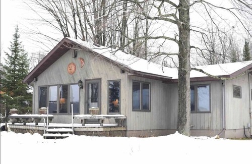 Rhinelander Cabin | Quiet waterfront cabin near Tomahawk & Minocqua, Pet friendly
