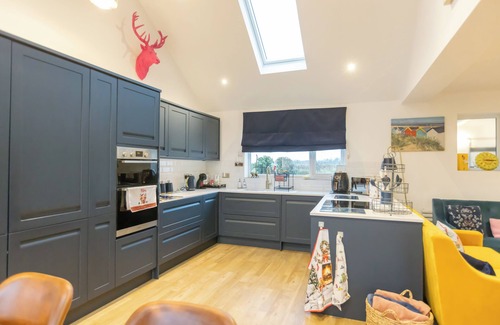 Herne Bay House | Quirky bungalow on coastal walk with distant sea views. Fully secure garden.