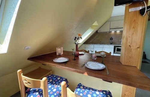 Marckolsheim Apartment | Résidence jaune et rose by Interhome