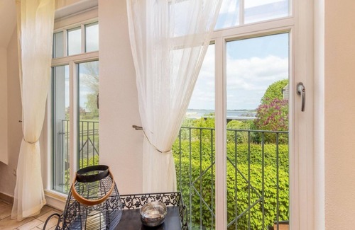 Zudar Apartment | Rügenbrise mit Seeblick - Fewo OG