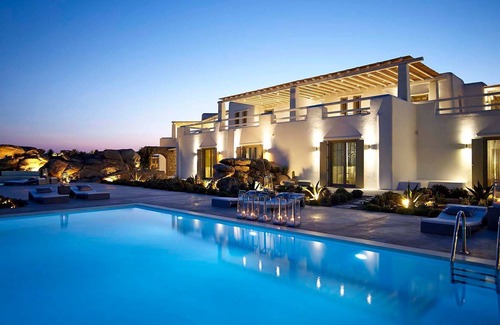 Paradise Villa | R 1413 Paradise Retreat With BBQ, Outdoor lounge and dining areas & Sun loungers.