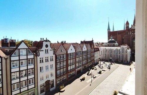 Old Town Apartment | RABE Old Town Apartment – Two-Level Retreat Above the Rooftops of Gdańsk